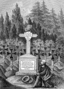 Mourning man at the tomb of Friedrich Weidig in the cemetery in Darmstadt