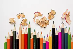 Multicolored colouring pencils on white background
