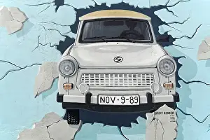 Mural, Test the Best, Trabi breaking through wall