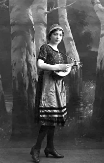 Musician, woman plays banjo, set design