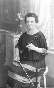 Musician, woman posing with violin