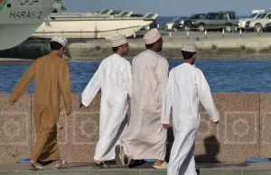 Muslim men at the harbour of Muscat