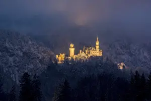 Mystical castle in the winter fog