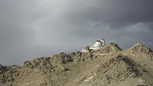 Framed Print : Namgyal Tsemo Buddhist monastery in Leh perched on a rocky hill under impending clouds