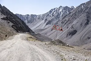 Narrow gravel track in mountain landscape at Chong Ashuu Pass