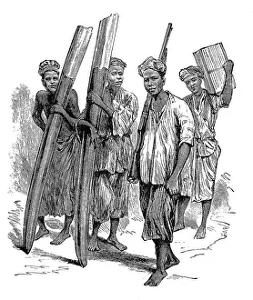Native burden-bearers carrying ivory in the Congo