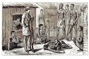 Natives standing in front of a hunter who shot a gorilla that had a cub