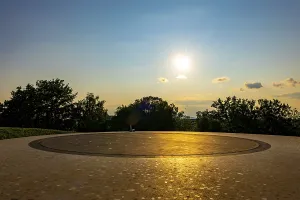 Nature Park with Panoramic View and an Airplane and a Chair in a Sunny Summer Day in Circle