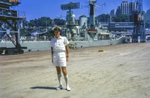 Naval officer standing in front of Leander Class frigate HMS Minerva ship, Rio de Janeiro, Brazil, South America, Royal Navy, slide dated April 1972, South America