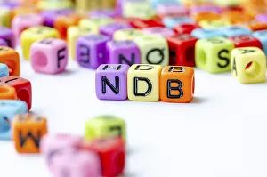 NDB text on multicolored cubes representing Nature Driven Blueprint