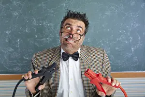 Nerd electronics technician retro teacher silly expression working battery clamps