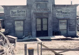 Nevada City historic ghost town, Montana, USA sign for Zang's beer, post office, hot baths, general mercantile shop store 1976