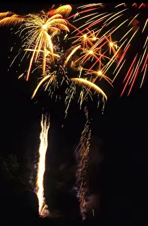 New Year's Eve fireworks, vivid fireworks in the night sky with golden