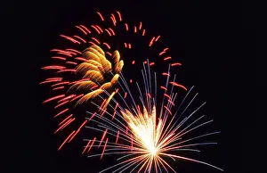 New Year's Eve fireworks, vivid fireworks in the night sky with golden