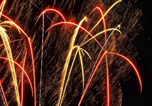 New Year's Eve fireworks, vivid fireworks in the night sky with golden