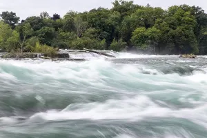 Niagara Falls is the collective name for three waterfalls that straddle the international border between Canada