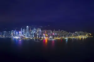Night aerial view panorama of Hong Kong skyline and Victoria Harbor