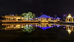 Nocturnal scene with illuminated pavilions