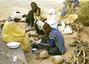 Nomads preparing a meal, Tassili Plateau, Sahara Desert, near Djanet, Algeria, North Africa 1973, Africa