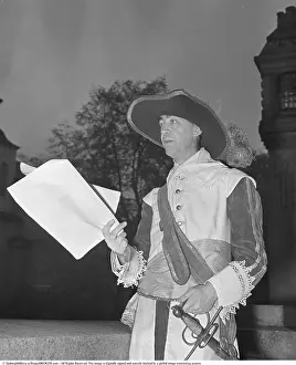 Norrkoping, 1941. In front of the city's town hall stands a man holding a document from which he reads aloud