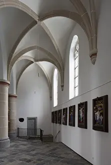 North aisle, view to the west with the Stations of the Cross and exit to the crypt