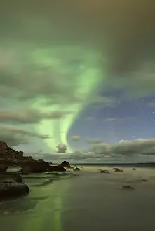Northern Lights, Aurora Borealis above the beach of Utakleiv