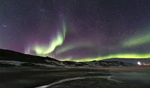 Northern Lights (Aurora borealis) over landscape near Myvatn