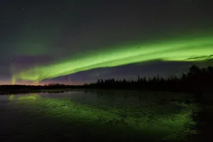 Northern Lights (Aurora borealis) reflected in the Taerendoeaelven