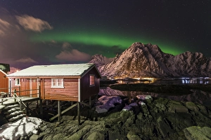 Category Scandinavia Prints: Northern lights or aurora borealis over Rorbuer fishing cottage