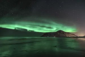 Category Scandinavia Prints: Northern Lights (Aurora Borealis) with starry sky at the beach