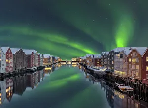 Northern Lights Bakklandet historical warehouses Trondheim Norway