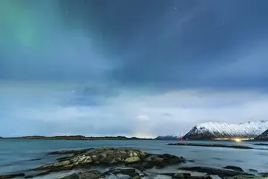 Northern lights with beach of Gimsoy