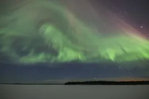 Northern Lights over frozen lake