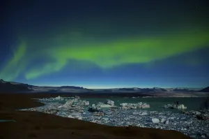 Northern lights over the glacier lagoon of Joekulsarlon