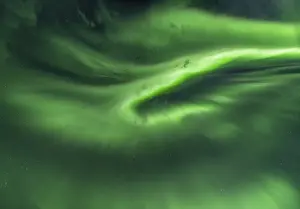 Northern lights in front of a starry sky