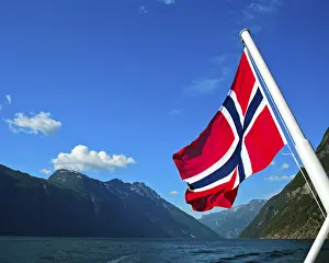 Norwegian national flag, ship in the Geiranger fjord