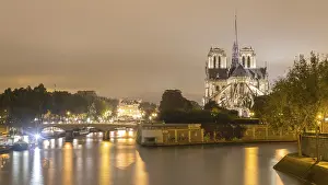 Notre Dame with river Seine, night view