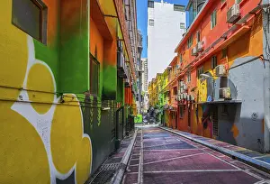 Nov 26, 2019 - Kuala Lumpur, Malaysia: Beautiful alleyway with colorful street art and murals walls on sunny day