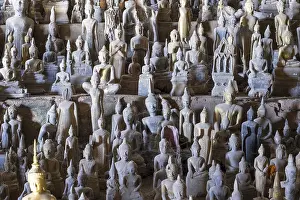 Numerous Buddha statues in Pak Ou Cave