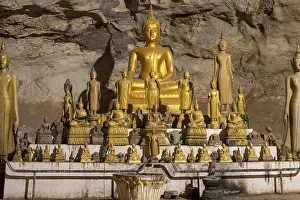Numerous Buddha statues in Pak Ou Cave
