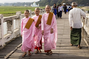 Nuns on U-Bein Bridge, the longest Teak-Wood Bridge in the world