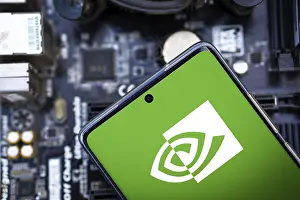 Category Historic EN Prints: NVIDIA logo on phone and blurred chip on the background-Dhaka