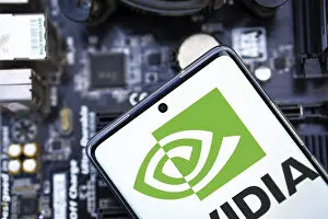 Category Historic EN Prints: NVIDIA logo on phone and blurred chip on the background-Dhaka