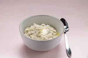 Oatmeal with butter in a white plate