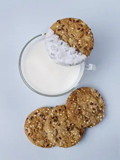 Oatmeal cookies and cup of yogurt, selective focus