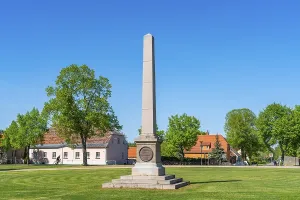 Obelisk in the ensemble of buildings at Neuhardenberg Castle