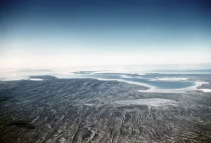 Oblique angle aerial view of water in Lake Eyre, South Australia, Australia, 1956 Kati Thanda-Lake Eyre an endorheic salt lake, Oceania