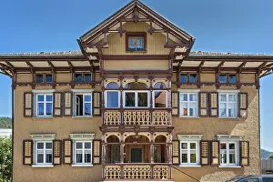 Ochre-yellow facade with half-timbering
