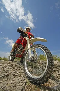 Off-road motorcyclist on rocks in the south of France