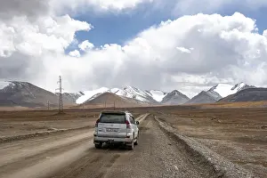 Off-road vehicle on a gravel track